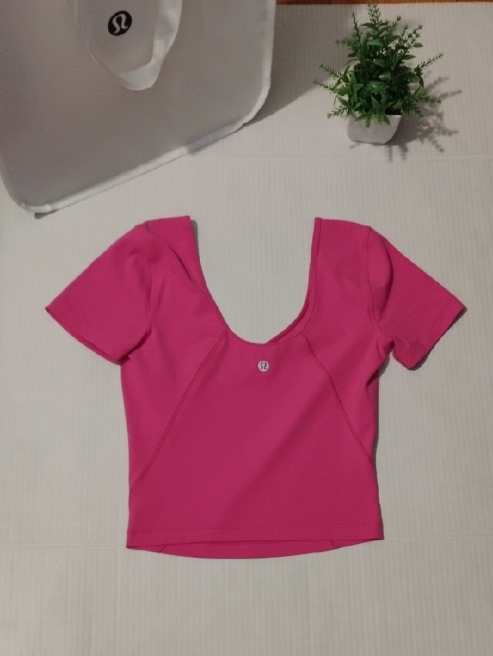 lululemon athletica Short Sleeve Align Top. Hot Pink in color. Women's size 4. - Picture 6 of 8